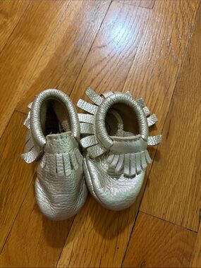 Freshly Picked Metallic Gold Fringe Baby Moccasins